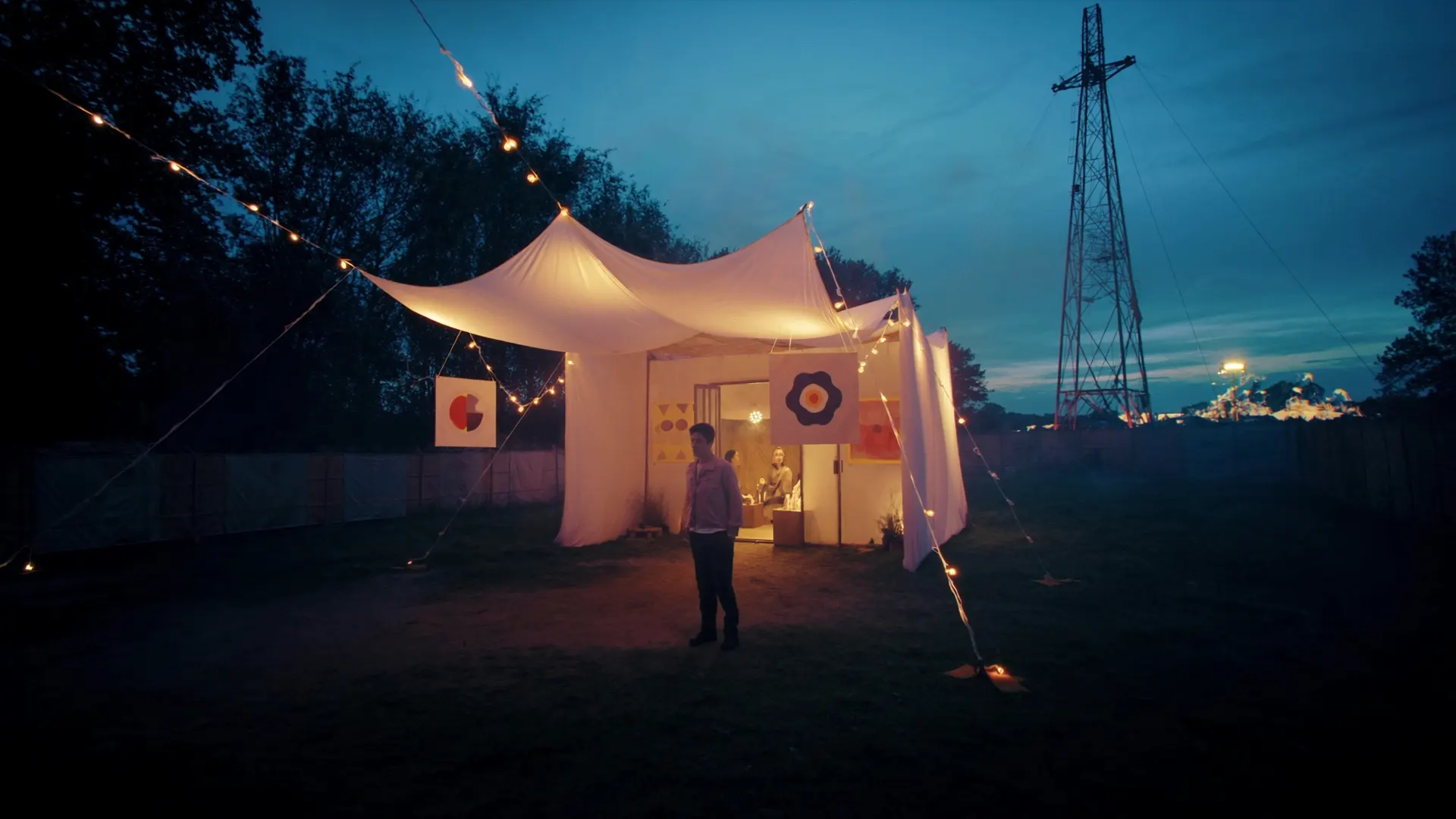 Art festival pop-up pavilion at dusk